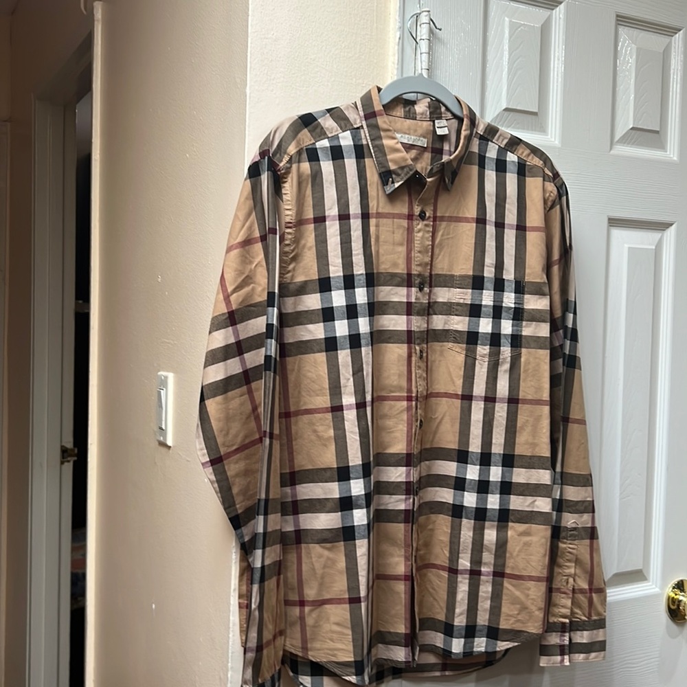 Burburry button down shirt.it’s like new